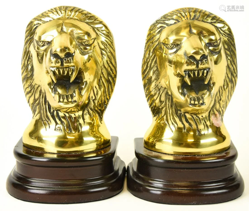 Pair Brass Lion Head Form Bookends on Wood Stand