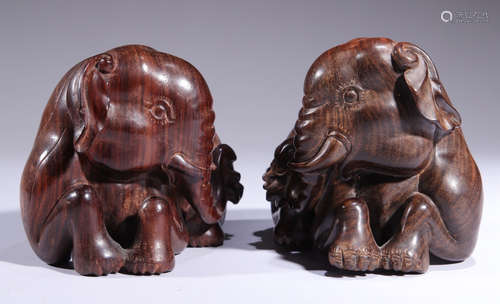 PAIR OF SUANZHI WOOD ELEPHAN PENDANTS