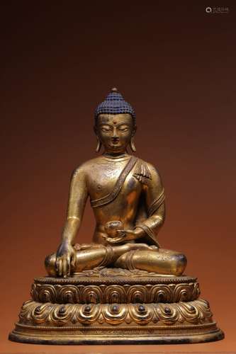 GILT BRONZE CAST 'SHAKYAMUNI' SEATED FIGURE