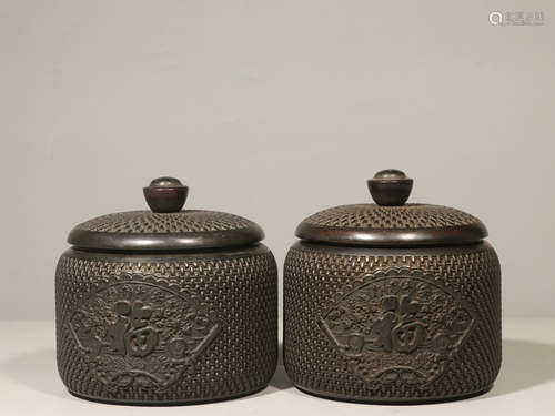 PAIR OF ZITAN WOOD CARVED 'FU' TEA JARS WITH LIDS