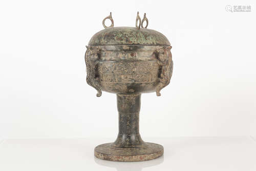 ARCHAIC BRONZE CAST STEM FOOT RITUAL VESSEL WITH LID AND INS...