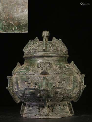 ARCHAIC BRONZE CAST 'TAOTIE' RITUAL VESSEL WITH LID