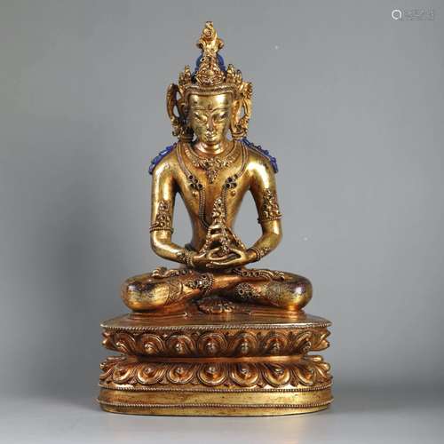 A GILD BRONZE STATUE OF AMITAYUS BUDDHA