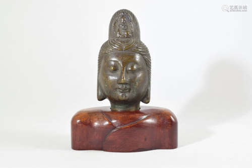 A Bronze Buddha Head with Wood Stand