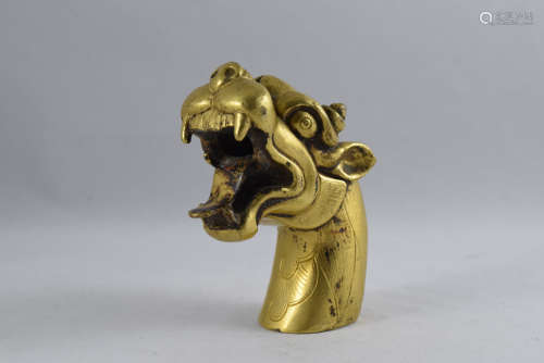 A Gilt Bronze Beast Head Figure