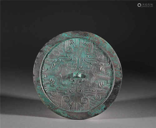 Copper mirror with dragon pattern carving from Han漢代饕鬄紋...