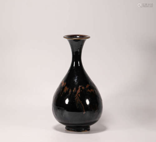 Brown glazed jade spring vase from Song宋代醬釉玉壺春瓶