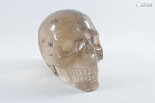 A Tea Color Cystal Skull Figure