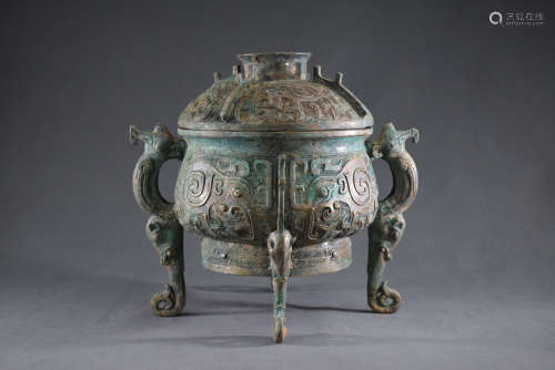 A Chinese Bronze Beast Pattern Three Feet Container