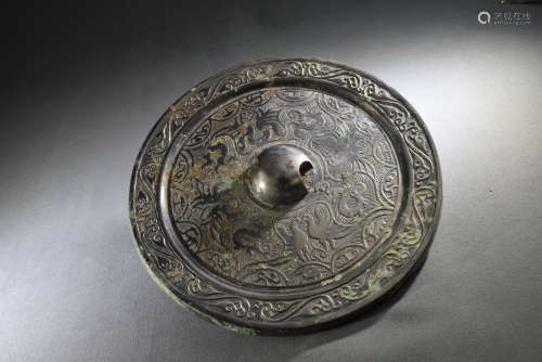 A Chinese Bronze Mirror