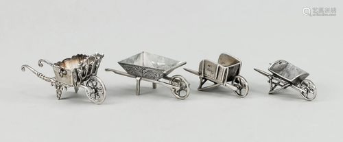 Four miniature wheelbarrows, 2