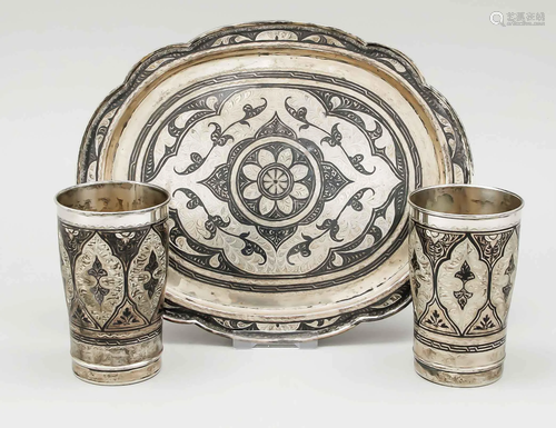 Two cups on oval tray, probabl