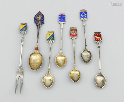 Six souvenir spoons and 1 fork