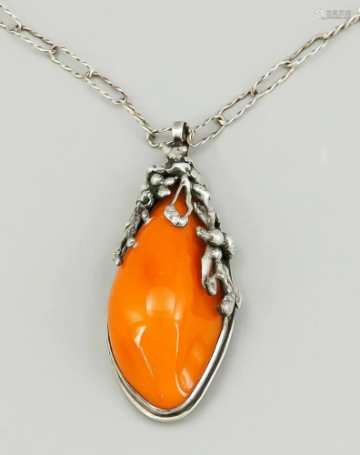 Amber pendant with silver moun
