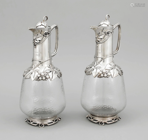 Pair of carafes with silver mo