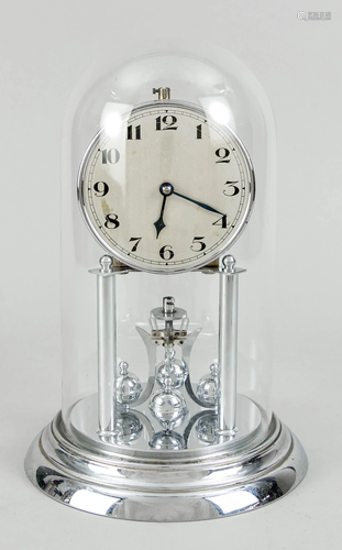 Rotating pendulum clock chrome