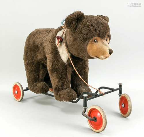 Steiff riding bear on wheels,