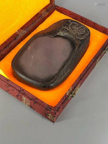 DUAN INKSTONE CARVED WITH BIRD AND GRAPES