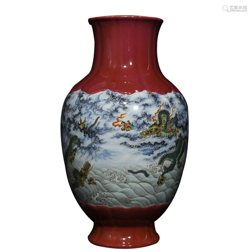 RED GROUND FAMILLE ROSE 'DRAGON' VASE WITH FLUTED SIDES