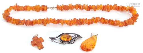 Mixed Lot: amber fragment necklace, two pendants and a brooc...