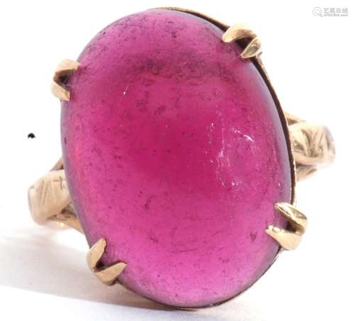 Yellow metal and pink cabochon stone ring, the large pink ca...