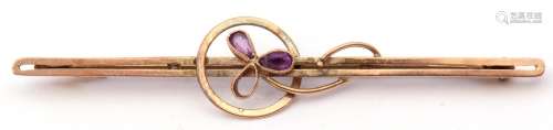 9ct stamped amethyst brooch of open work design, centring an...