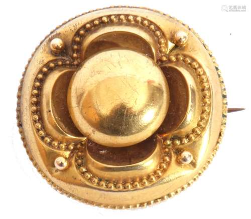 Victorian gold Etruscan revival target brooch, typically dec...