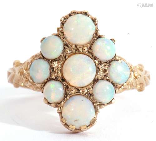 9ct gold opalescent cluster ring of lozenge shape, featuring...