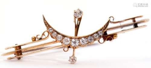 Vintage yellow metal and diamond crescent brooch, the triple...