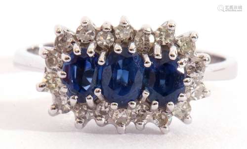 18ct white gold, blue stone and diamond ring centring three ...