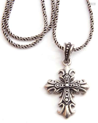 A 925 marked Gothic cross pendant suspended from a rope twis...