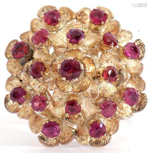 Yellow metal and ruby set cocktail ring of domed shape, with...