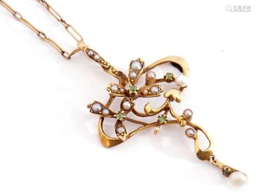 Art Nouveau open work pendant in a stylised yellow scroll mo...