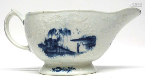 Early Lowestoft porcelain sauce boat, the body with impresse...