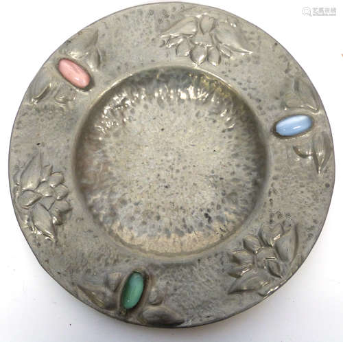 Small metal dish with planished effect, inset with stones in...