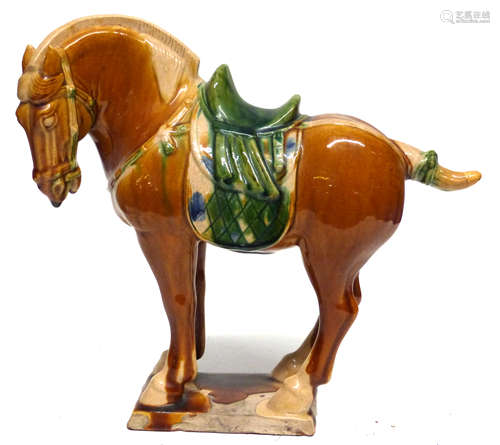 Replica of a Chinese Tang period horse in typical colours of...