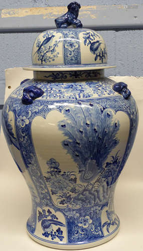 Large Chinese porcelain jar and cover modelled with panels o...