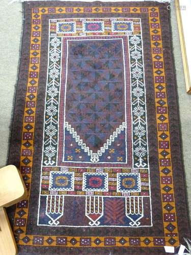 Small Iranian wool prayer rug with geometric patterns in dar...