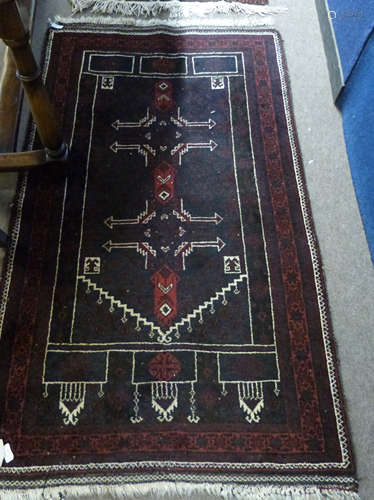 Iranian wool prayer rug in dark blue and cream, to a dark re...