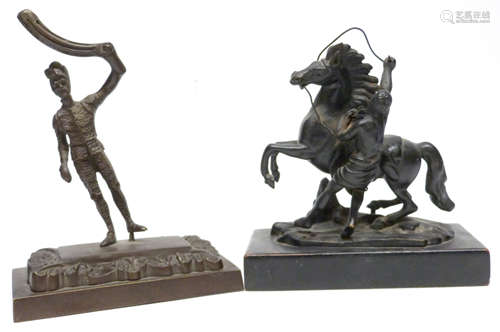 Two bronzed metal sculptures, one of a Hussar on rectangular...