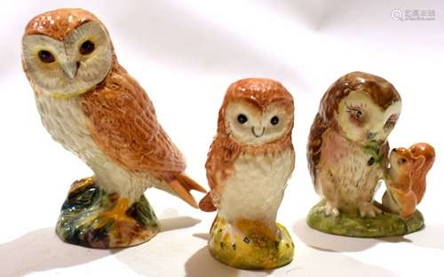 Group of two Beswick owls and a further Beatrix Potter Beswi...