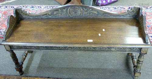 20th century carved oak hall or window seat with three-quart...