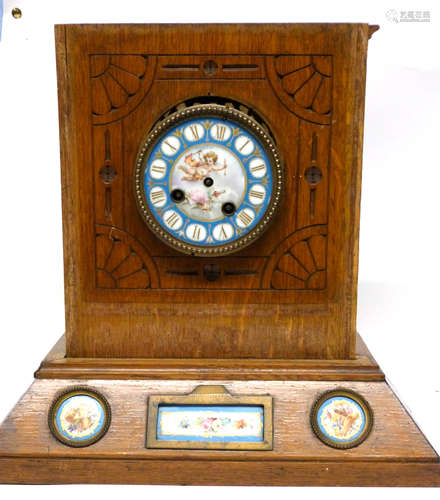 Sevres style clock with dial and inset into a light oak wood...