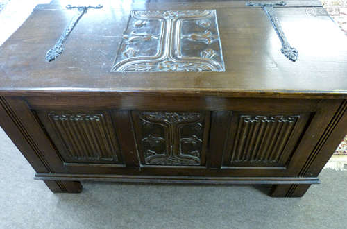 20th century carved oak coffer, the lid with wrought iron st...