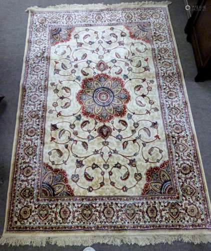 Kashmiri ivory ground full pile rug, with medallion centre, ...