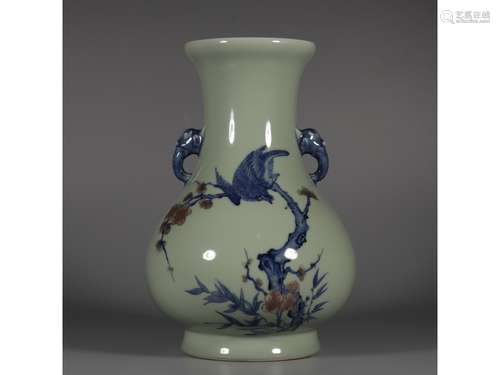 A CELADON-GROUND VASE