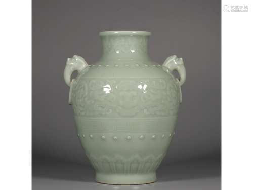 A CELADON-GLAZE JAR