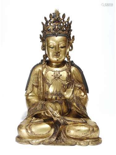 A GILT-BRONZE FIGURE OF GUANYIN