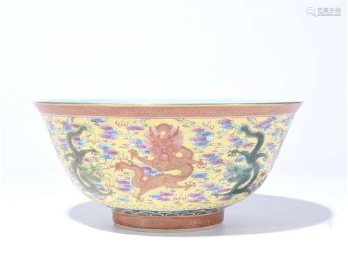 A FAMILLE ROSE YELLOW-GROUND DRAGON BOWL