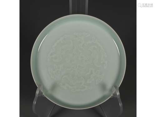 A CELADON-GLAZE PLATE